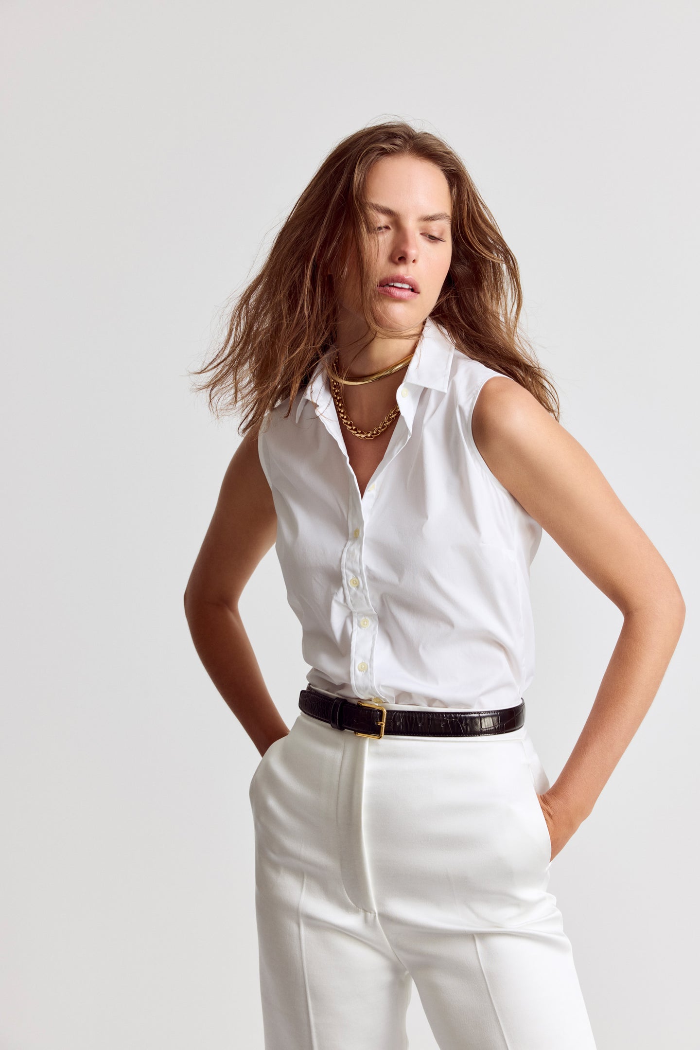 womens white dress tops The Sleeveless Shirt White / XXS